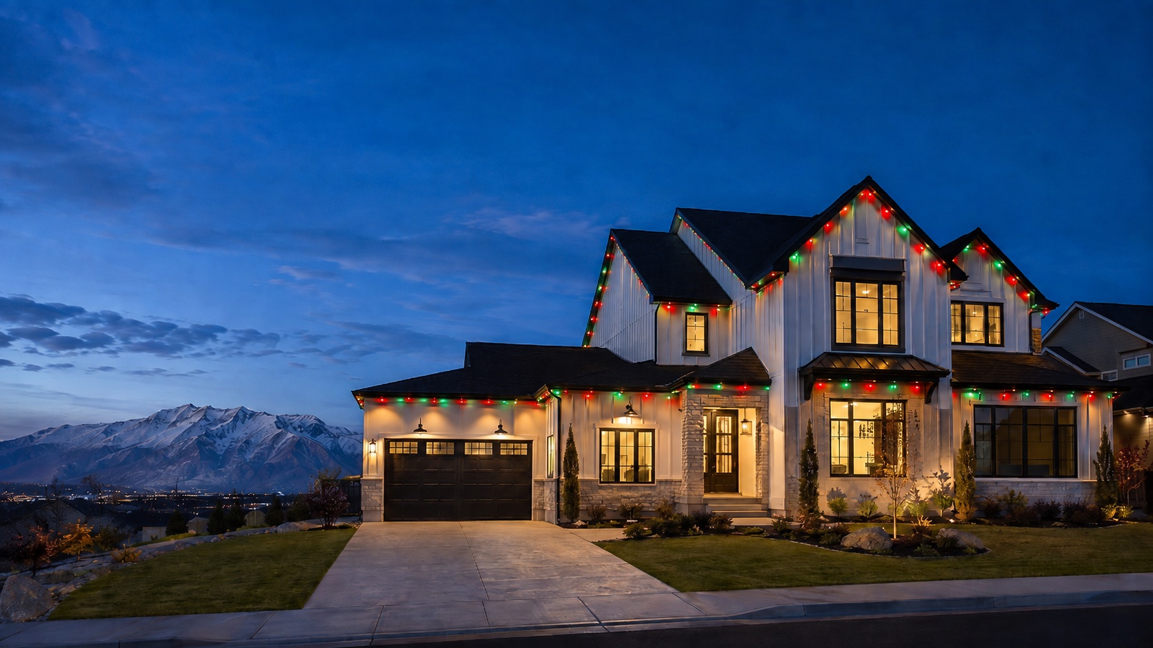 Utah home at dusk with its roofline traced in permanent LED lighting